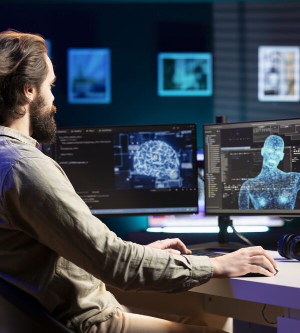 AiGSES-Artificial intelligence becoming sentient, greeting IT expert at desk